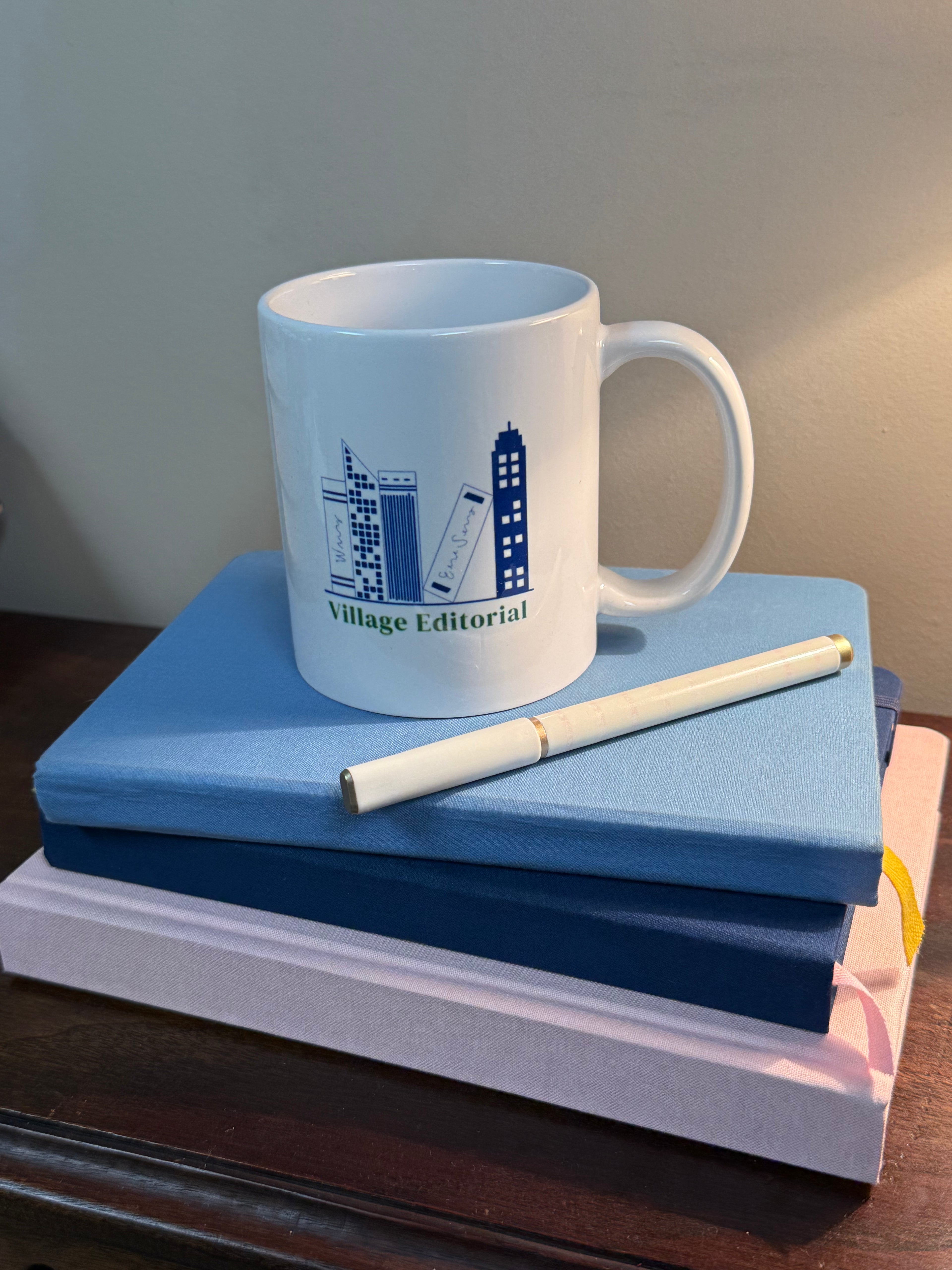 Village Editorial Coffee Mug